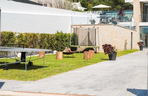 Carreco Villa | Portugal Active Sunset Beach Lodge I Heated Pool