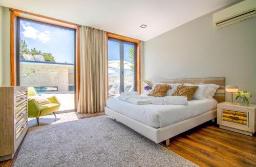 Carreco Villa | Portugal Active Sunset Beach Lodge I Heated Pool