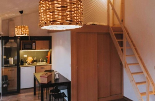 Peso Apartment | Premium 30 m² suite for up to 4 guests, with private bathroom, kitchenette and mezzanine. Nespresso, Marshall sound system and robes. Shared seasonal pool, garden and outdoor areas. Free gated parking. Pets: €7/night.