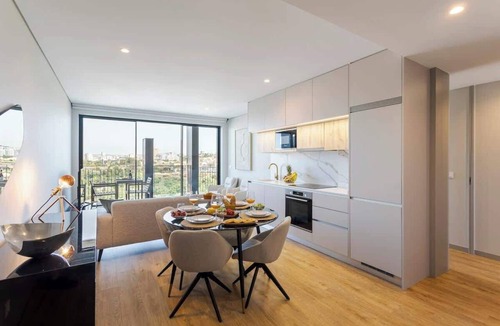 Santa Marinha Apartment | Premium Flat w/Balcony & Shared Pool by HostWise