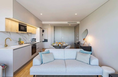Santa Marinha Apartment | Premium Flat w/Balcony & Shared Pool by HostWise