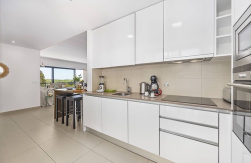 Quarteira Apartment | Relax by the pool at this Algarve apartment gem.
