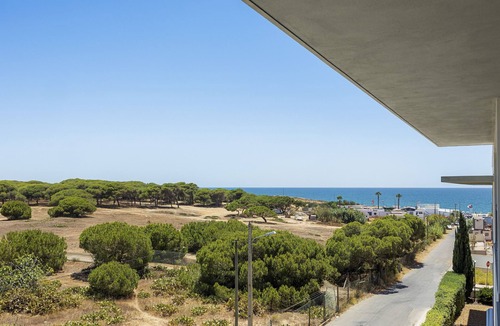 Quarteira Apartment | Relax by the pool at this Algarve apartment gem.