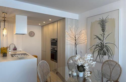 Fao Apartment | Riverside duplex by the sea with pool and balcony