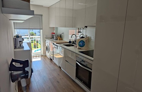 Fao Apartment | Smiling Waves Apartment with Shared Pool, Private Rooftop Terrace, and Wi-Fi