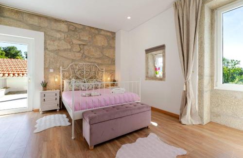 Vila Nova de Gaia Apartment | Stone Walls & Sunlit Terrace Retreat by HostWise