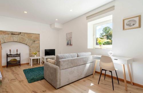Vila Nova de Gaia Apartment | Stone Walls & Sunlit Terrace Retreat by HostWise