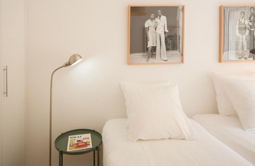 Santa Engracia Apartment | Stylish Home With Private Patio by LovelyStay