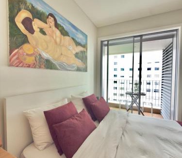 Lumiar House | Suíte aconchegante