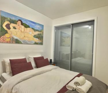 Lumiar House | Suíte aconchegante