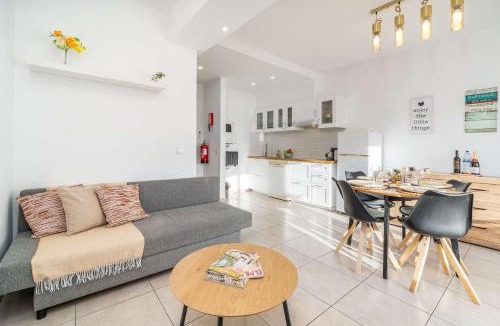 Areias de Sao Joao Apartment | Sunlit Balcony & Open Space Flat by HostWise
