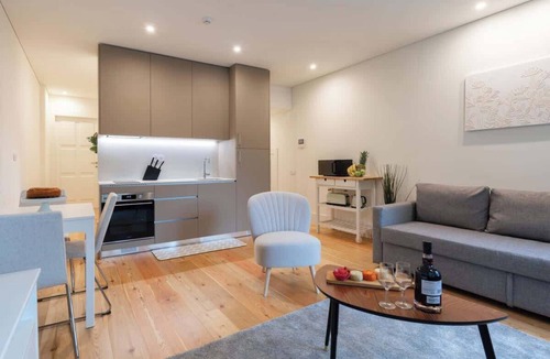 Oliveira do Castelo Apartment | Sunny Flat w/Balcony by Host Wise