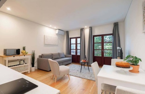 Oliveira do Castelo Apartment | Sunny Flat w/Balcony by Host Wise
