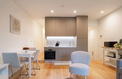 Oliveira do Castelo Apartment | Sunny Flat w/Balcony by Host Wise