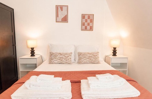 Alfama Apartment | Terracotta Lisbon Duplex with Mezzanine
