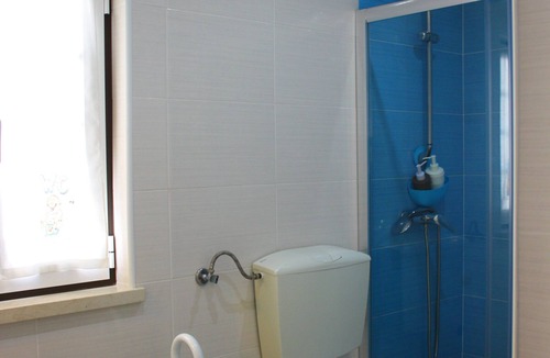 Nazare Apartment | Traditional beach house featuring Portuguese handicrafts