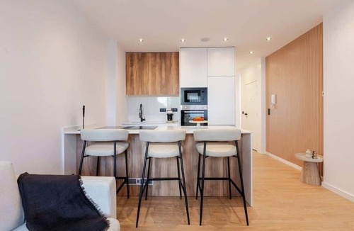 Bonfim Apartment | Urban Terrace & Stylish Living Spaces by HostWise
