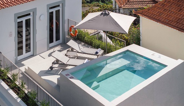 Beautiful villa with rooftop pool | CarmHim in Calheta