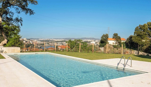 Elegant Flat with Pool and Garage by HostWise