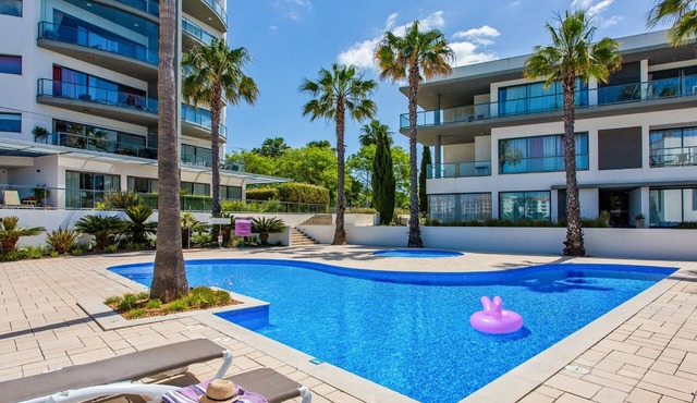 Experience ultimate relaxation in Quarteira's beachfront paradise.