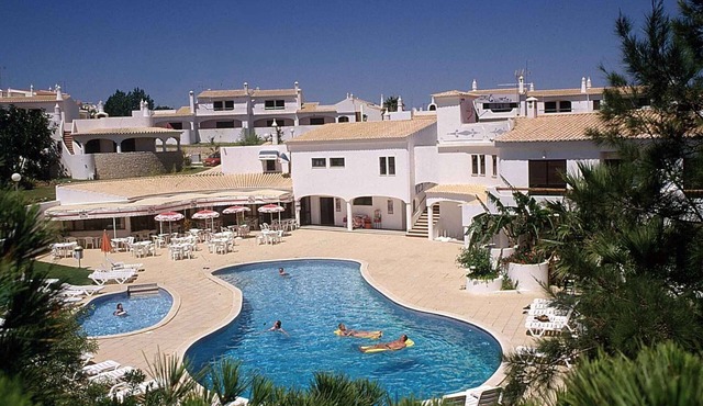 Holiday apartment with air conditioning, balcony, and pool