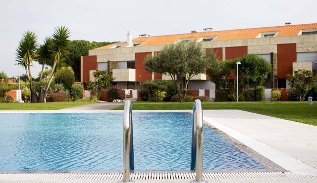 Home in condominium on the beach, with swimming pools, tennis court and garden