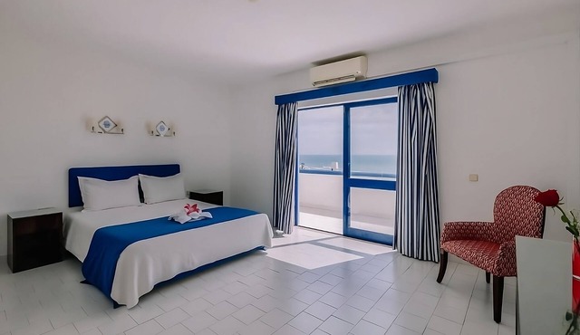 Oura Beach Getaway! Two Spacious 2BR with Full Kitchens, Beachfront, 2 Pools!
