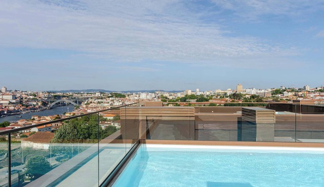 Premium Flat w/Rooftop Pool & Garage by HostWise