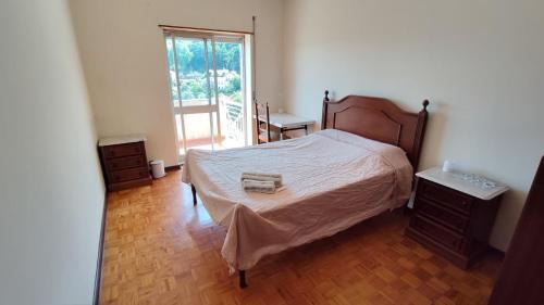 Quarto privado com varanda, wi-fi, linda vista, perto da UBI
