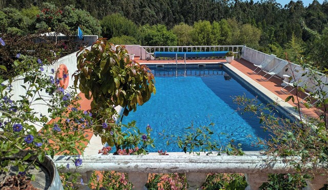 Secluded traditional country house in extensive grounds, with private pool.