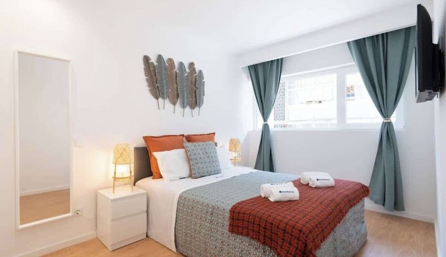 Sunny Cozy Flat w/Balcony by HostWise