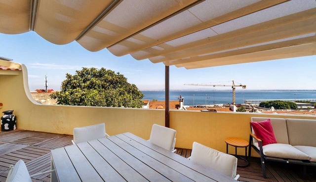 Sunny Terrace Apartment w/River Views in Lisbon