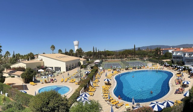 This place spells H-O-L-I-D-A-Y. Beautiful 2 bed apartment overlooking the pool