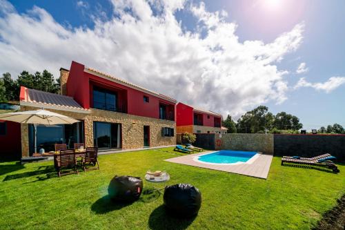 Vilas Felicidade Rocha by an island apart in Calheta