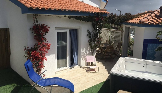 Villa Atlantida. Terrace with access to the hot tub garden. in Salir do Porto