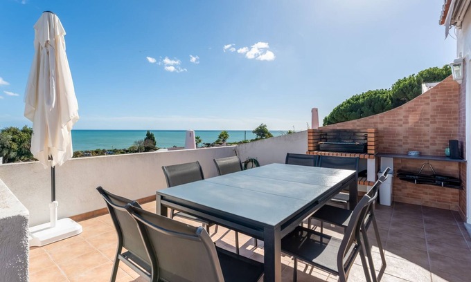 Alporchinhos House | Ocean View 3 BDR House With Patio by LovelyStay