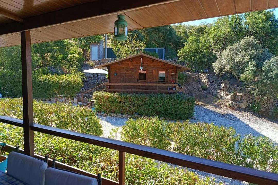 Alcaria Cova Ski Chalet | Tranquil Chalet Retreat with Shared Pool in Esti, Portugal