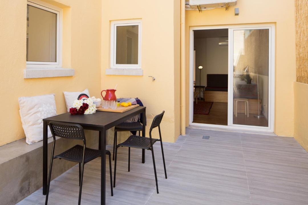 Santa Engracia Apartment | Stylish Home With Private Patio by LovelyStay
