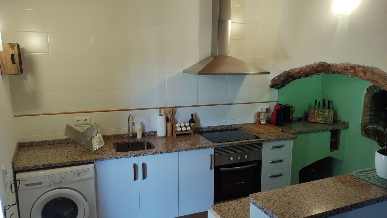 Photo of Kitchen in Santa Catarina da Fonte do Bispo