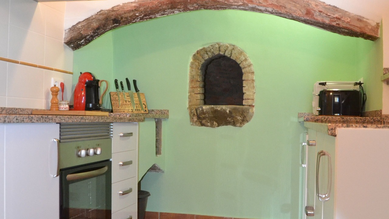 Photo of Kitchen in Santa Catarina da Fonte do Bispo