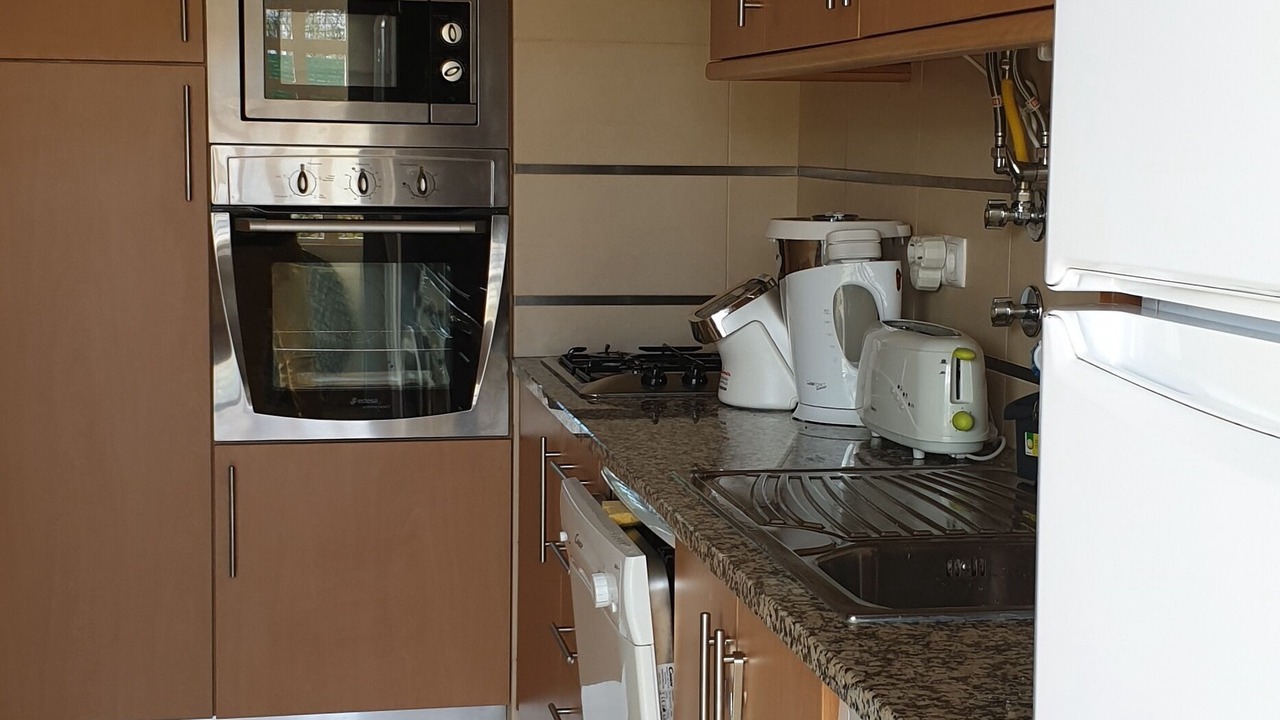 Photo of Kitchen in Mexilhoeira da Carregacao