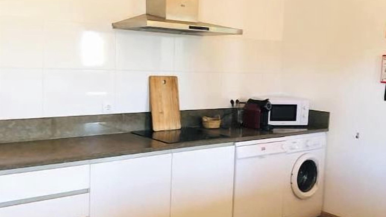 Photo of Kitchen in Santa Catarina da Fonte do Bispo