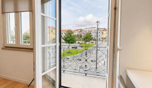 One-Bedroom Apartment with Balcony and City View