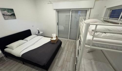 Quadruple Room with Shared Bathroom