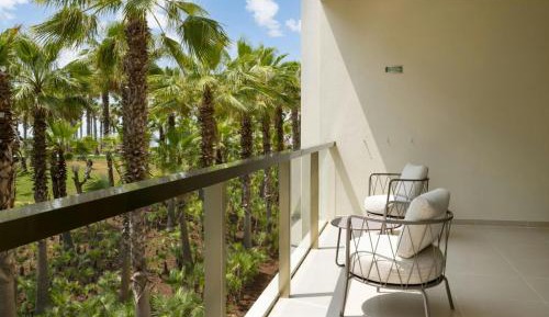 Three-Bedroom Suite with Balcony and Pool View