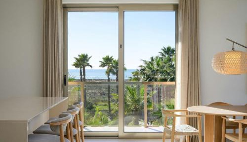 Three-Bedroom Suite with Balcony and Sea View