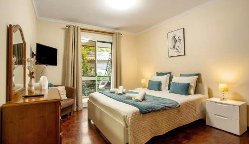One-Bedroom Apartment with Balcony and Mountain View  
