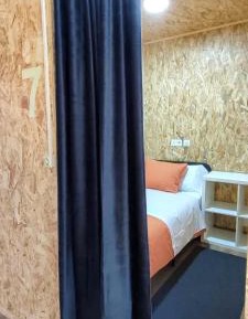 Single Bed in Dormitory Room
