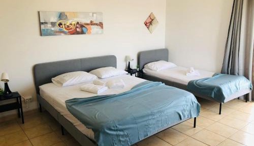 Quadruple Room with Shared Bathroom