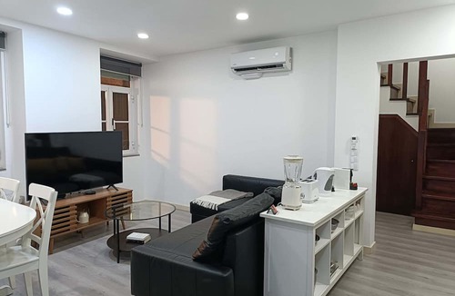 Merces Apartment | Chic Lisbon Duplex Tram Views Local Vibes